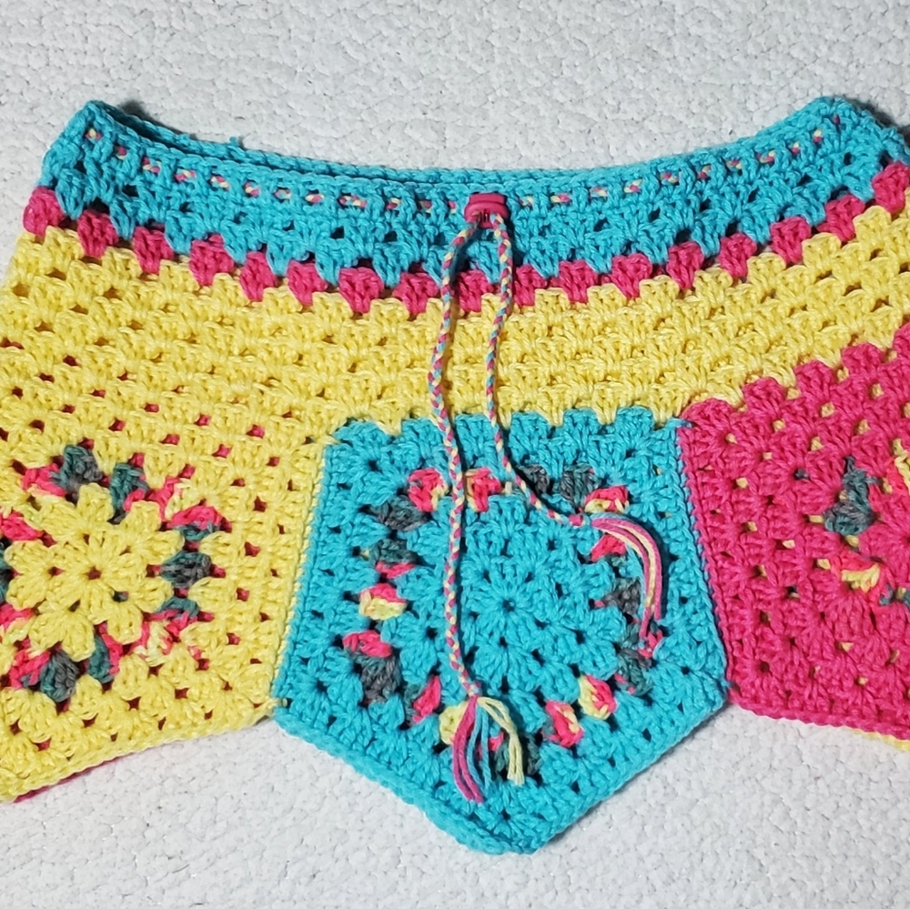 Handmade crochet skirt. Waist 37. Length 12 inches.